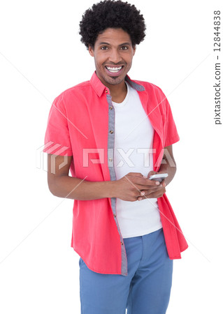 Happy causal man holding smartphone 12844838