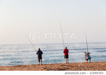 Fishermen Fishing From The Beach Fishermen Fishing From The Beach 12846303
