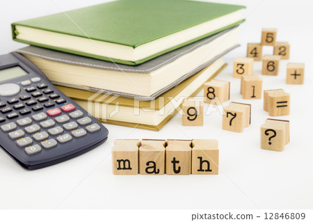 math wording and books on white background 12846809
