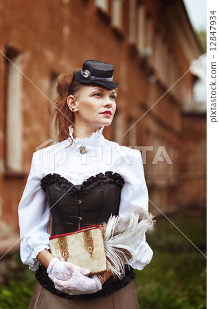 Beautiful redhair woman in vintage clothes 12847934