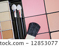 makeup brush and make-up eye shadows 12853077
