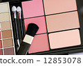 makeup brush and make-up eye shadows 12853078