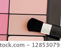 close up of a make up powder and brush 12853079