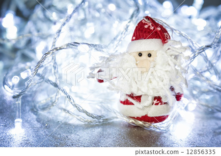 Santa Claus or Father Frost with Christmas lights Santa Claus or Father Frost with Christmas lights 12856335