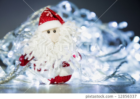 Santa Claus or Father Frost with Christmas lights Santa Claus or Father Frost with Christmas lights 12856337
