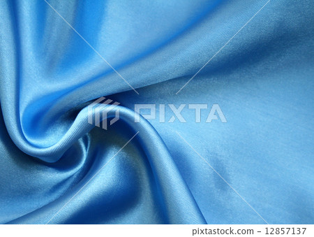 Smooth elegant blue silk as background 12857137