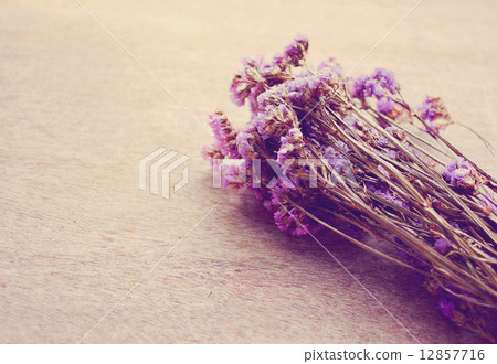 Statice flowers on wooden background 12857716