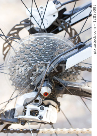 Rear mountain bike cassette on the wheel with chain. 12859093