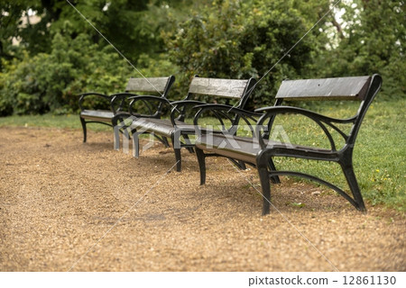 Stylish bench in autumn park 12861130