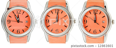 set of orange wristwatches with midnight time set of orange wristwatches with midnight time 12861601
