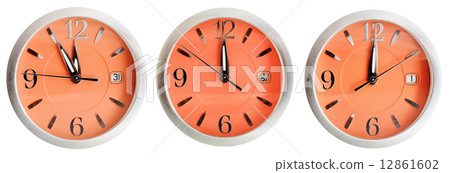 set of orange clock faces with midnight time 12861602