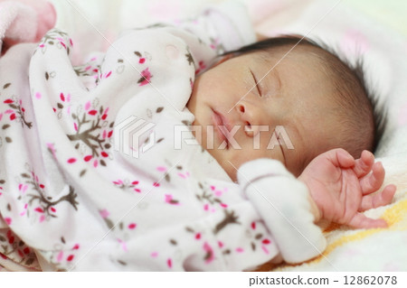 A baby's sleeping face of 1 month old baby 12862078