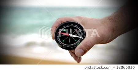 Male hand with Compass 12866030