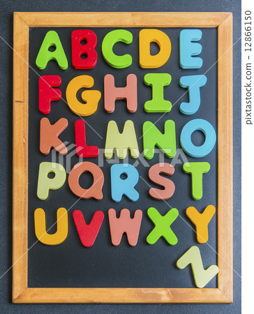 A to Z alphabet colorful wooden word on black board1 12866150