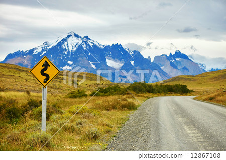 Winging road sign in Torres del Paine 12867108