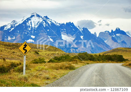 Winging road sign in Torres del Paine 12867109