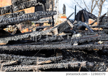 Ruins and remains of a burned down house Ruins and remains of a burned down house 12868370