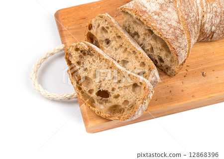 sliced bread on cutting board 12868396