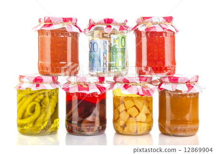 financial reserves money conserved in a glass jar 12869904