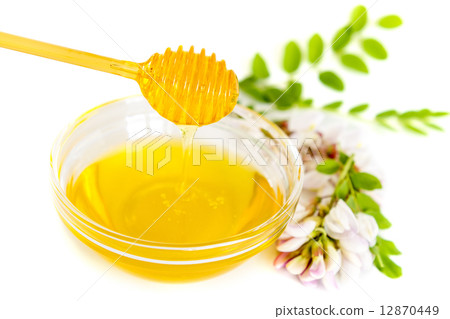 Honey in bowl and acacia flower Honey in bowl and acacia flower 12870449