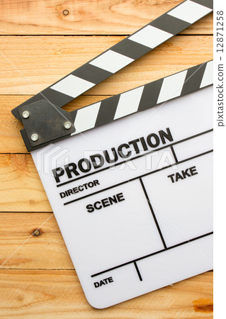 Movie slate film on wooden table 12871258