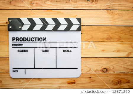 Movie slate film on wooden table 12871260