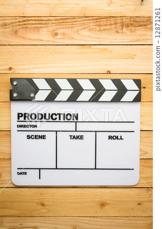 Movie slate film on wooden table 12871261