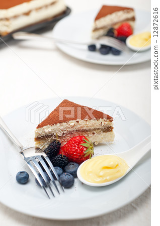 tiramisu dessert with berries and cream 12872616