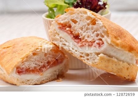 ciabatta panini sandwich with parma ham and tomato 12872659