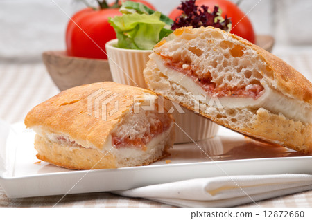 ciabatta panini sandwich with parma ham and tomato 12872660
