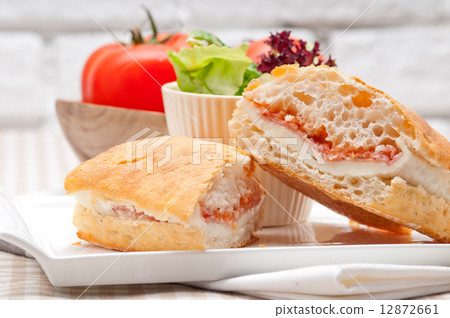 ciabatta panini sandwich with parma ham and tomato ciabatta panini sandwich with parma ham and tomato 12872661