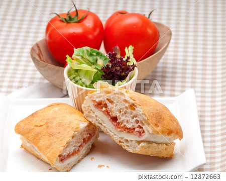 ciabatta panini sandwich with parma ham and tomato ciabatta panini sandwich with parma ham and tomato 12872663