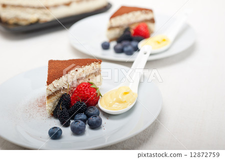 tiramisu dessert with berries and cream 12872759