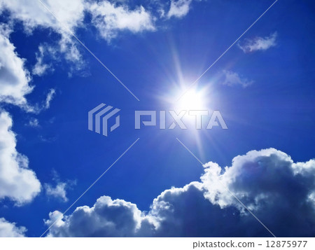 Blue sky with clouds and sunlight rays Blue sky with clouds and sunlight rays 12875977