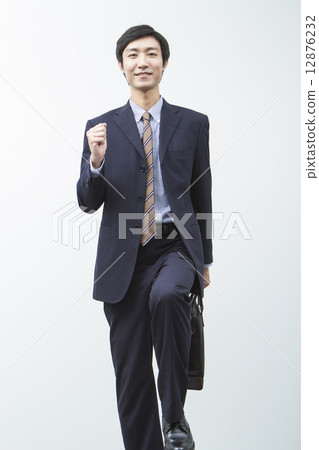 Walking businessman 12876232