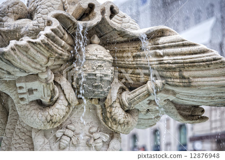 detail of triton fountain in rome 12876948