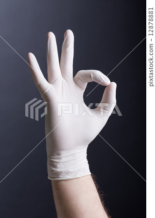 Male hand in latex glove (OK sign) 12878881