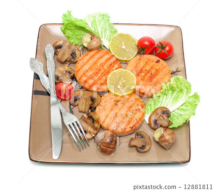 fried medallions of salmon, stuffed snails with mushrooms and ve 12881811