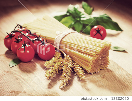 Spaghetti tomato and spices. Italian Cooking. Vintage retro hips Spaghetti tomato and spices. Italian Cooking. Vintage retro hips 12882020