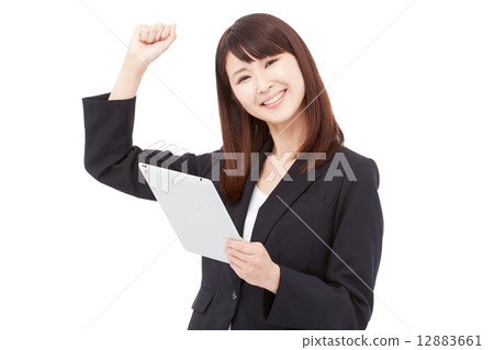 Business woman who takes a tablet and poses guts Business woman who takes a tablet and poses guts 12883661