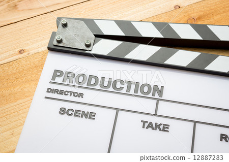 Movie slate film on wooden table 12887283