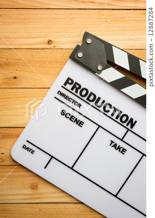 Movie slate film on wooden table 12887284