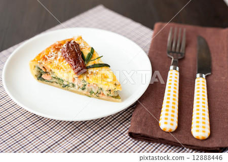 Piece of pie with spinach and fish salmon 12888446