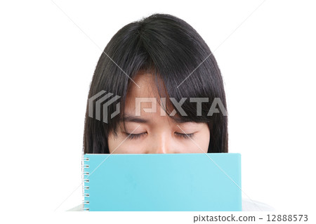 Asian girl reading a book 12888573