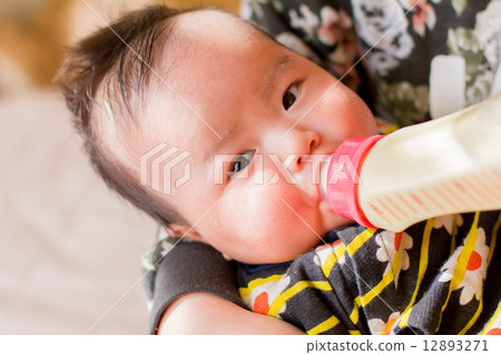 Baby drinking milk Baby drinking milk 12893271