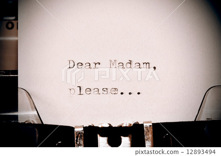 Text Dear madam typed on old typewriter 12893494