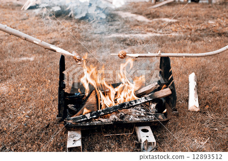 sausage on fire 12893512