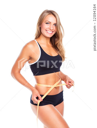 Woman measuring perfect shape of beautiful thigh 12894164