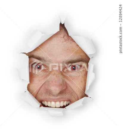 Violent evil man looks through a hole Violent evil man looks through a hole 12894424