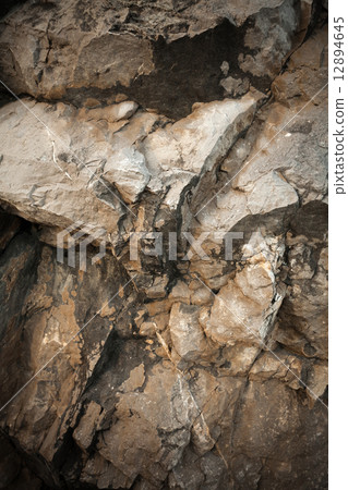 texture of brown and white cracked stone 12894645